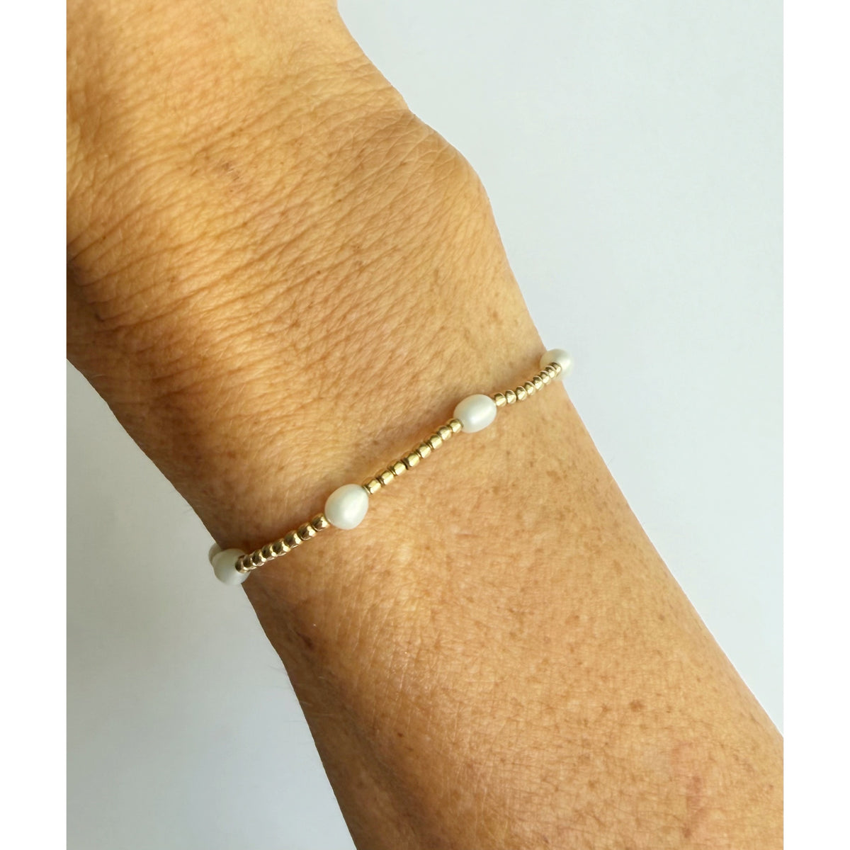 The Junie bracelet worn on the wrist